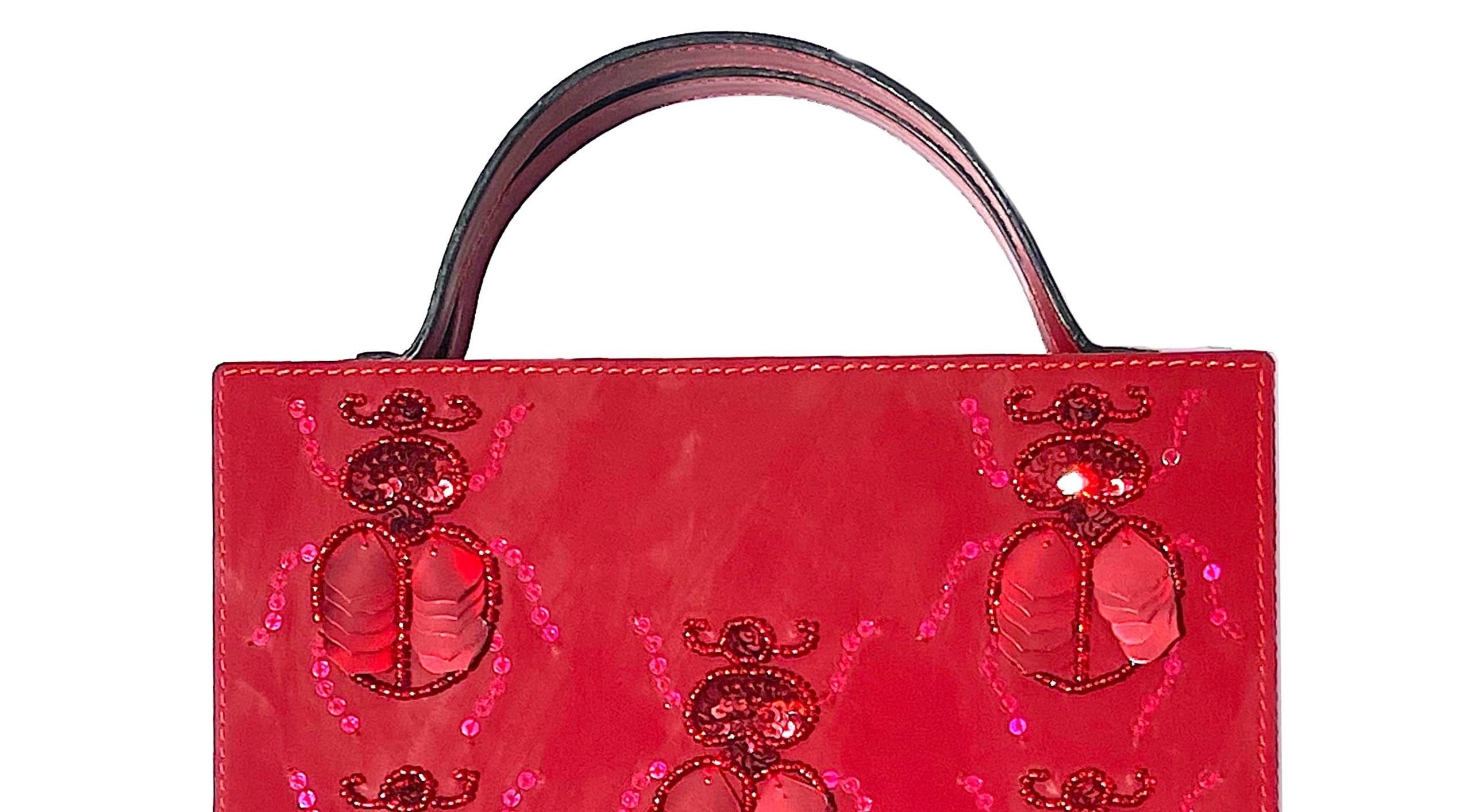 Red Velvet beetle briefcase ($375, Simitri)