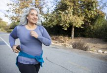 Woman with gray hair jogging