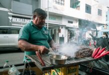 Things to Do This Weekend in Baltimore (April 10-12) A street food vendor cooking