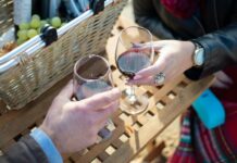 People drinking wine outside