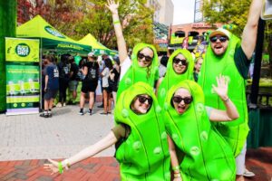 People pose in pickle costumes at the Big Dill Festival in Baltimore